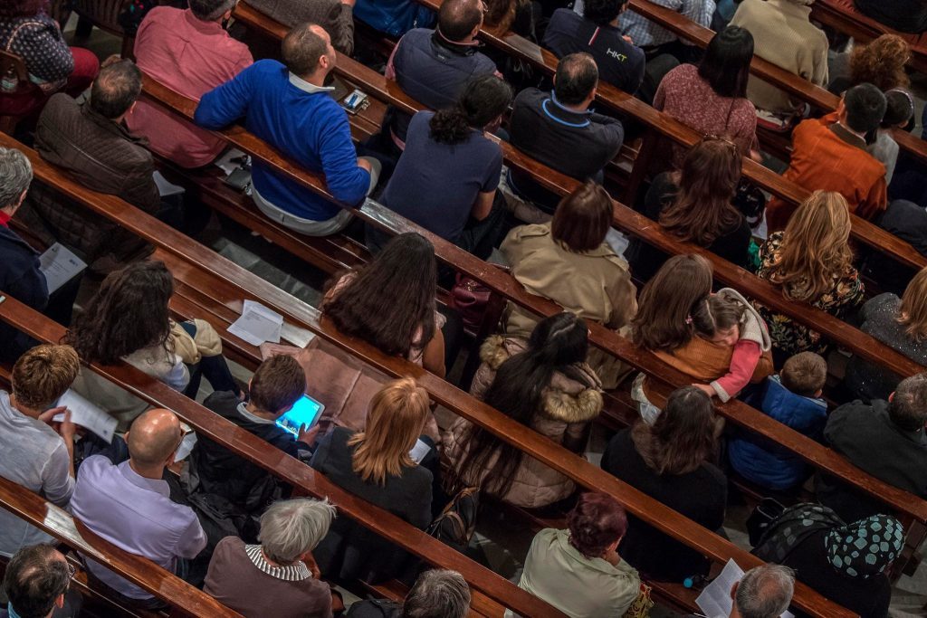 A child enjoying his time on the IPad, while the Lebanese Philharmonic Orchestra was playing during a concert in Beirut. (Nabil Ismail) via pow.photos