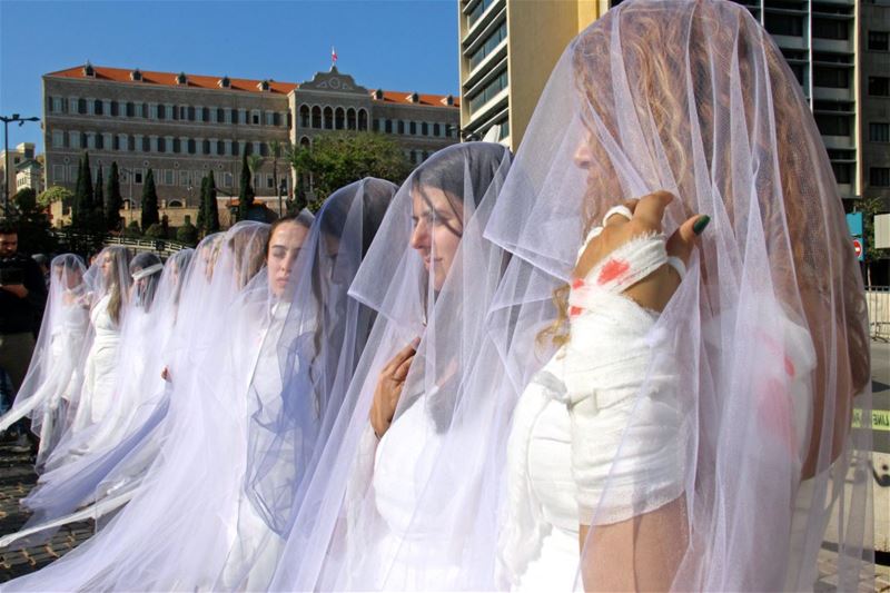 Activists from ABAAD, protesting against article 522 in the penal code at downtown Beirut.