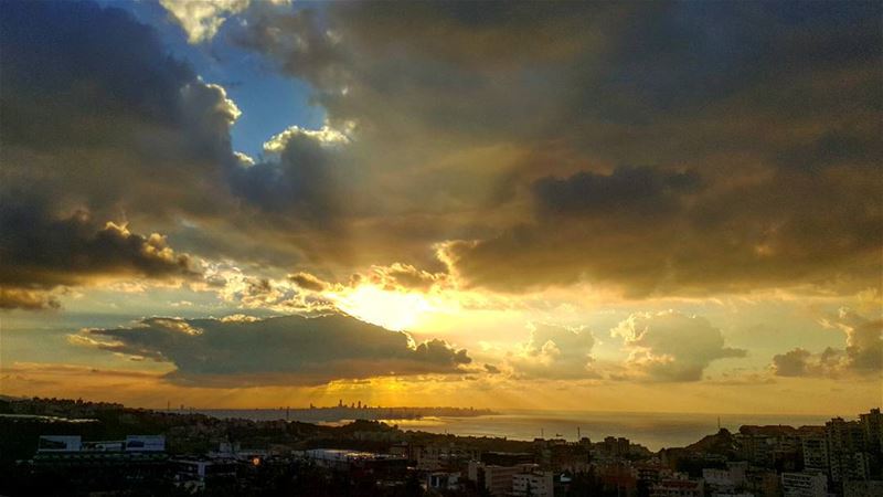 Caption while driving  sunset jounieh clouds blue sky lebanon water...