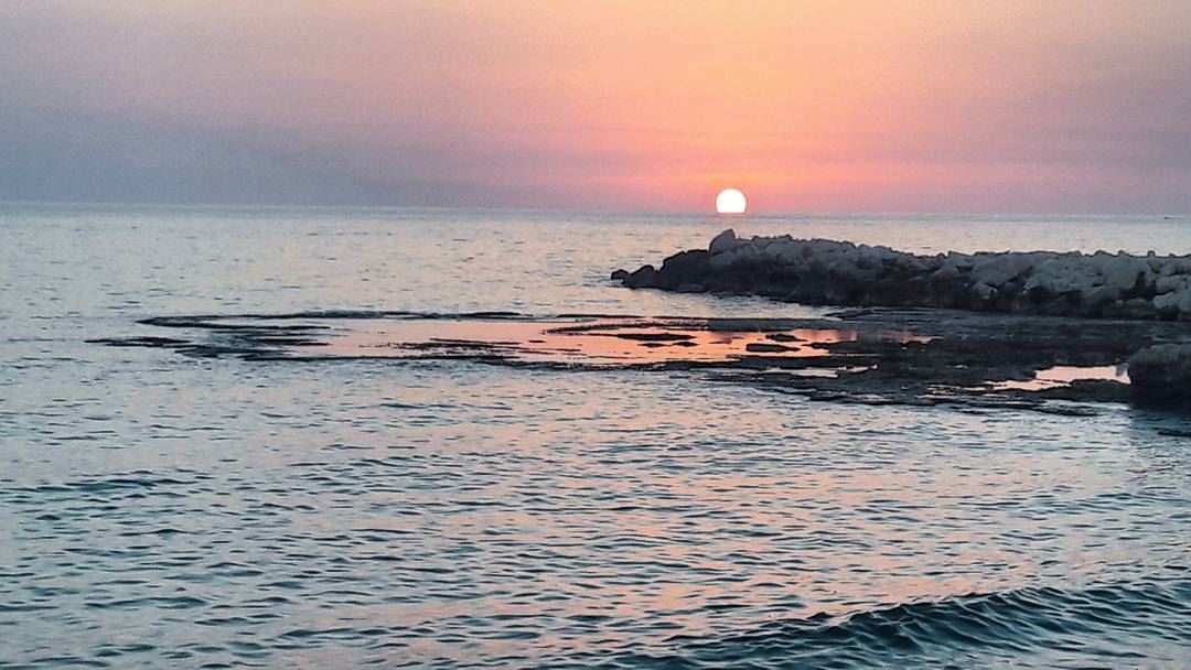 Enjoy every sunset 💛 Mediterranean  Sea  Sunset  People  Sky   Lebanon ... (الميناء مدينة الموج واﻷفق)