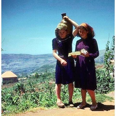 Hammana - May 1948 , Girls Carry potable spring water .