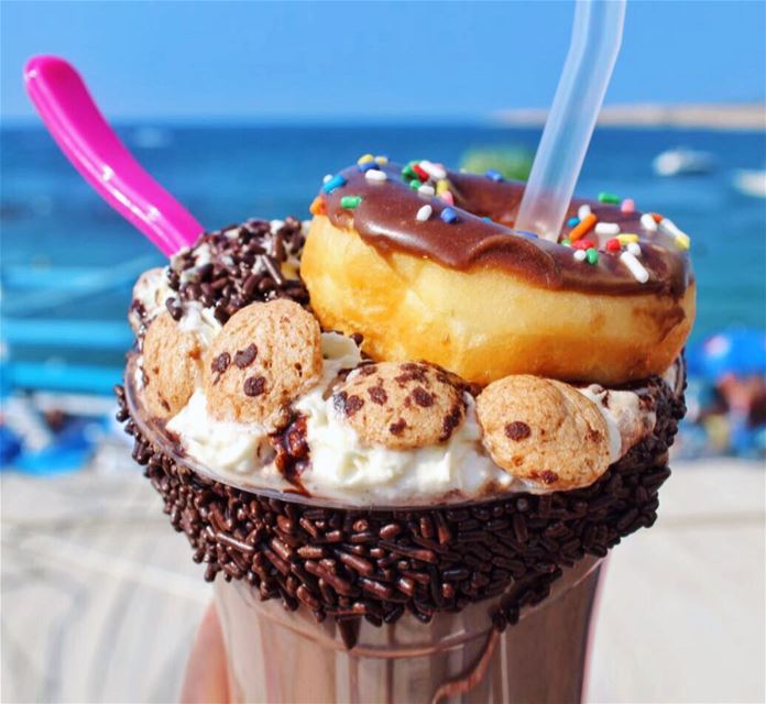 If you see me with my shake and nugget at the beach, Donut disturb 🍩 🐶🌞