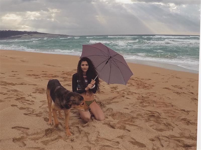 It was raining and we were already wet, so why not go for a swim?☺️🌂🐶.... (El Mansouri, Al Janub, Lebanon)