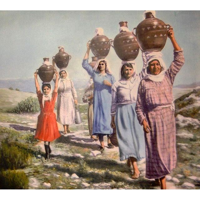 Merouaniyeh SouthLebanon Women with their water filled jar .