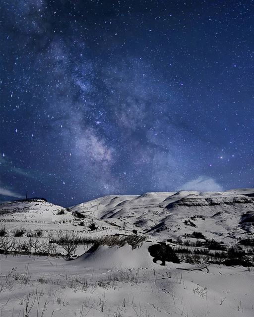 One foot in the snow another in the Milky way.🌌... (Zaarour Hills)