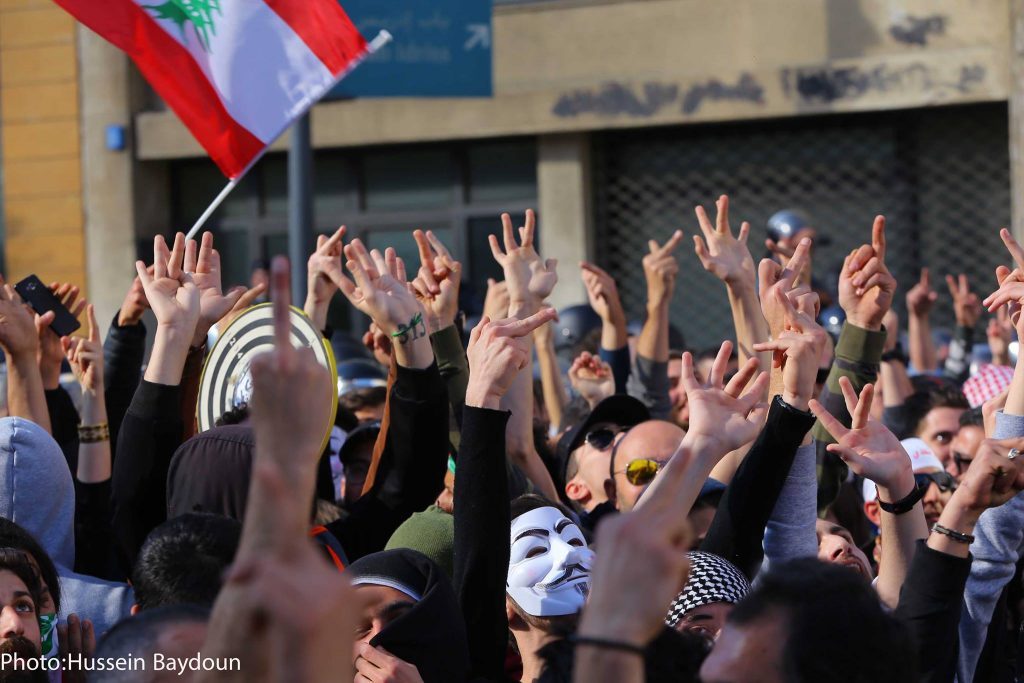 Raising the middle finger protesting the corruption and the government’s new tax plans, in Beirut. (Hussein Baydoun) via pow.photos