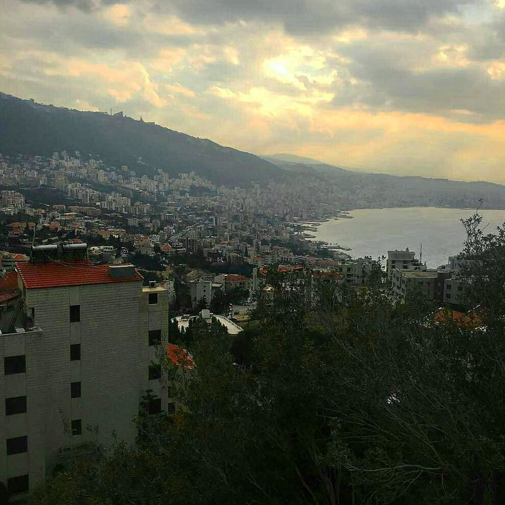 Ripples of sunset dance towards our feet, swirling into the colours from... (Adma, Mont-Liban, Lebanon)