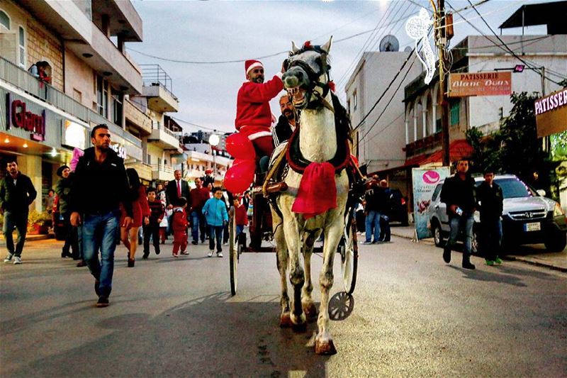 Smile. Santa Claude on a Horse (Okaybi)