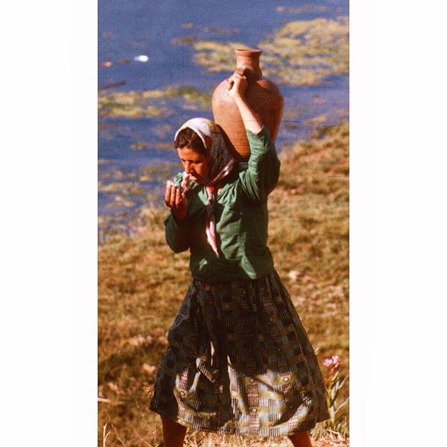 SouthLebanon Woman with their water filled jar .