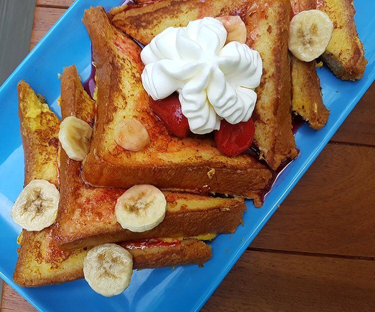 Strawberry & Banana French Toast! Super fluff stack with whipped cream on... (The Spot Choueifat)