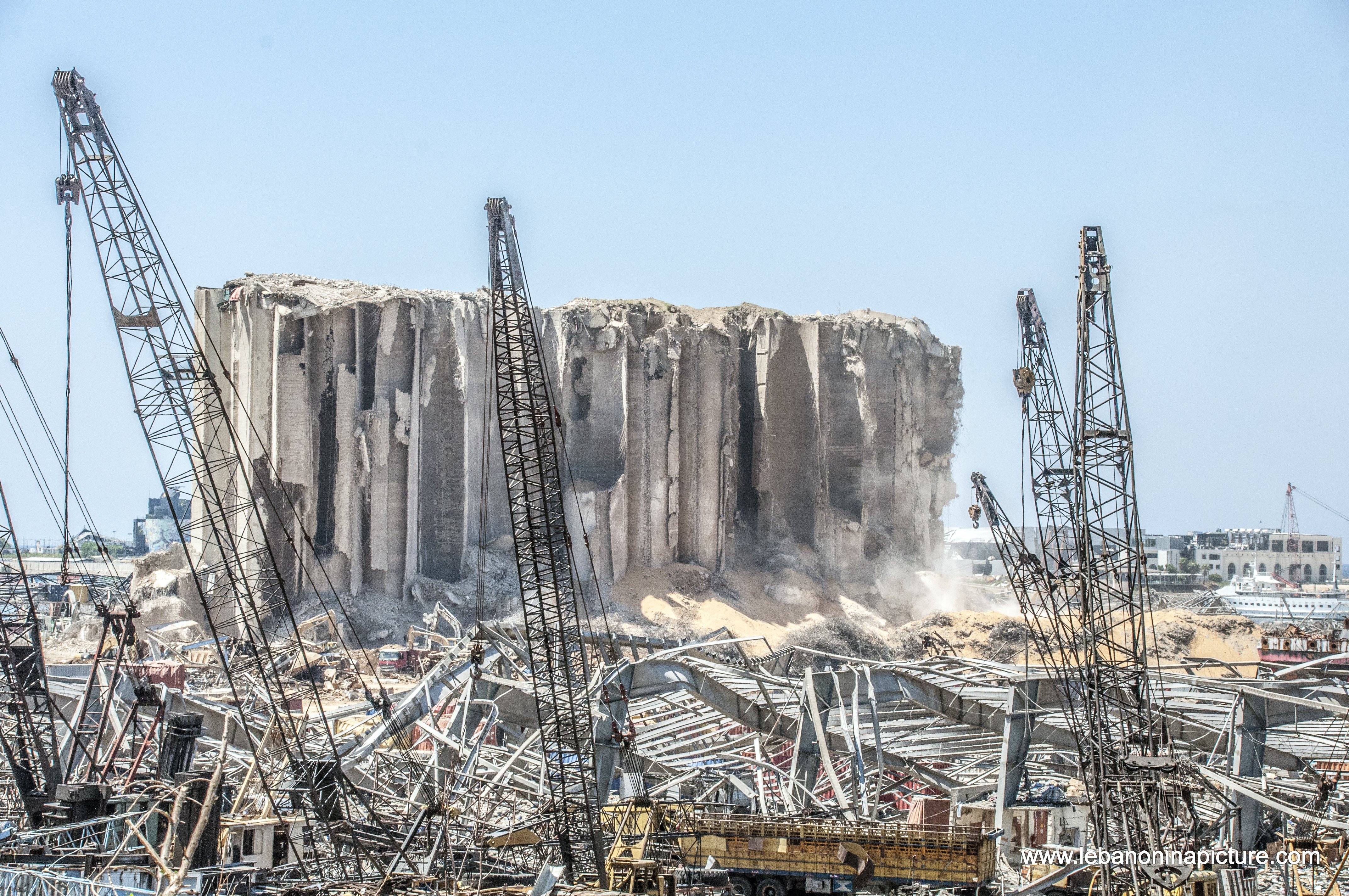 The still standing wheat storage and the explosion area in Beirut Port